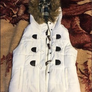 White sleeveless jacket